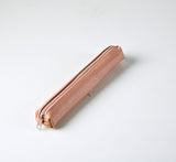 PENAL OVAL MINI ROSA PU