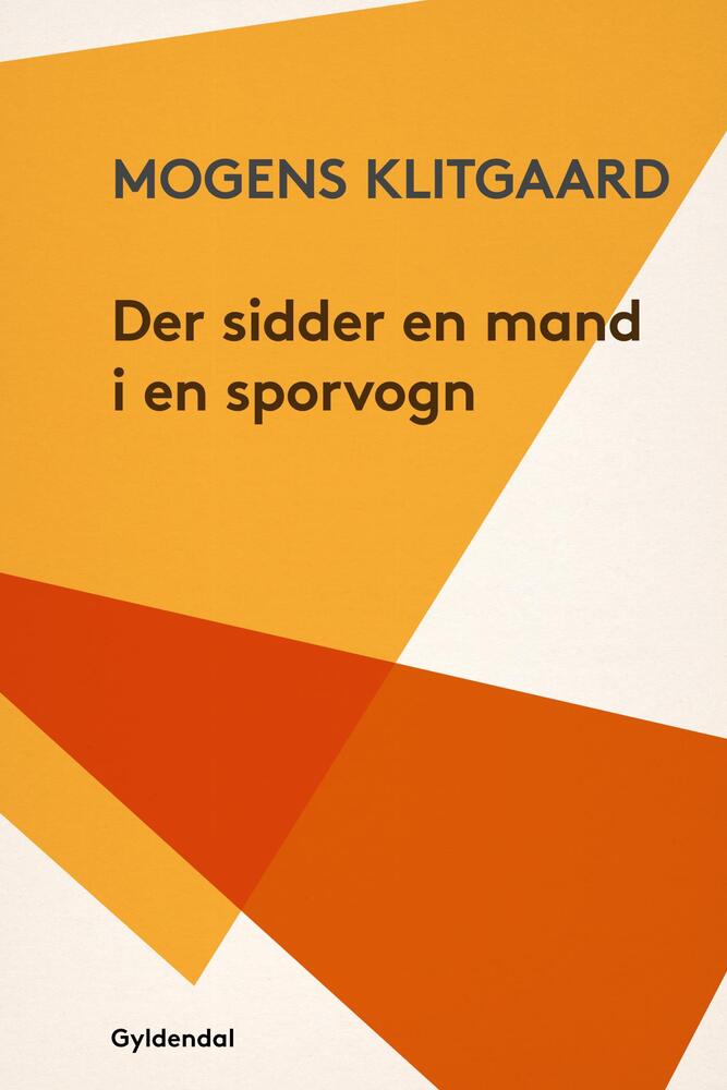 Der sidder en mand i en sporvogn