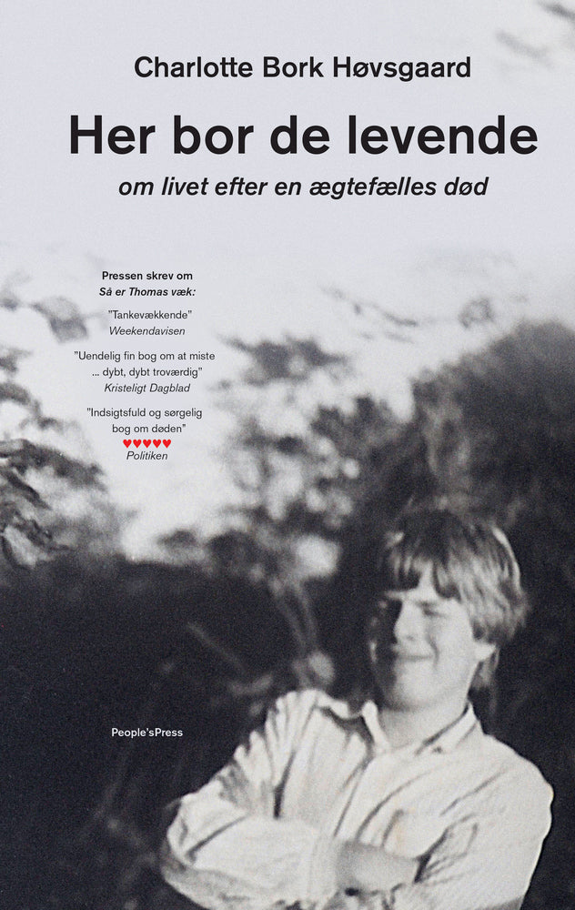 Her bor de levende
