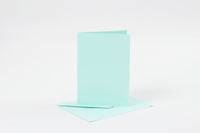 KORT OG KUVERTER KORT 10,5X15 CM LYS BLÅ 6SÆT