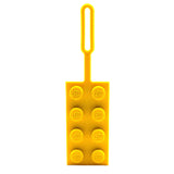 LEGO taskemærke, gul klods