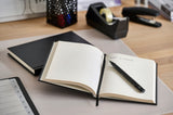 Notesbog sort A4 linieret